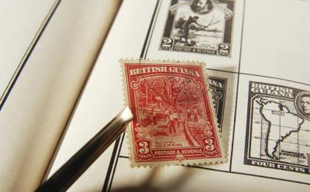 Placing stamp into album