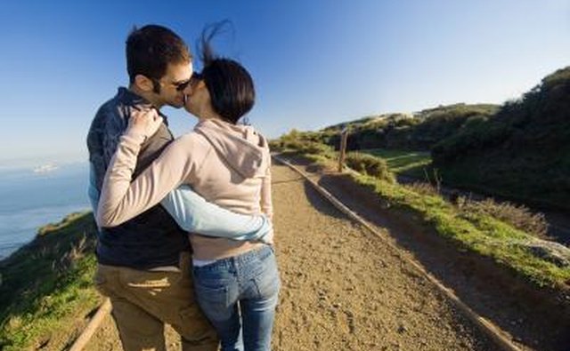 Couple kissing on walk