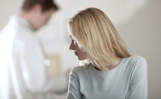 woman upset by husband's threats