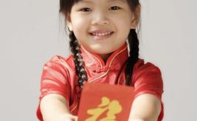 Children traditionally receive money on New Year's for wealth in the coming year.