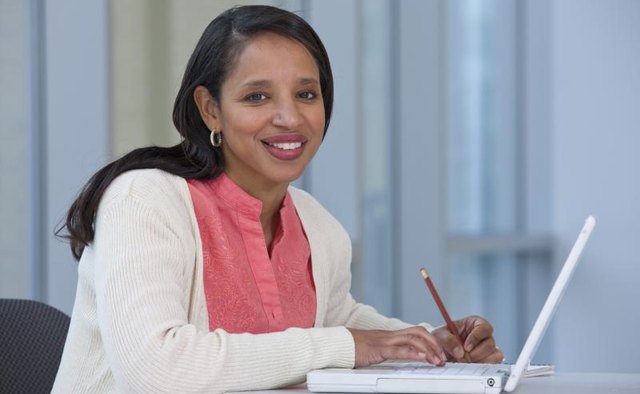 Woman working on grant application.