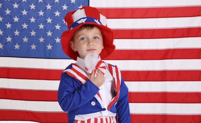 Boy wearing Uncle Sam costume.