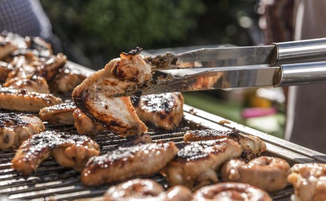 Grilling meat on the barbecue.