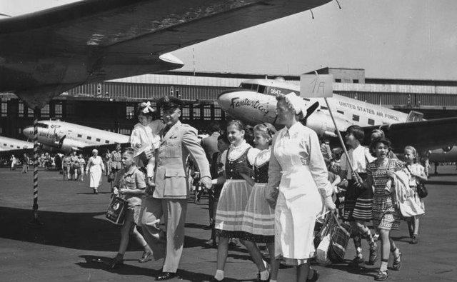 Children are flown out of West Berlin to West Germany on November 16, 1958.
