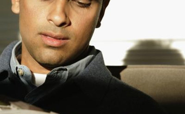Guy reading a magazine