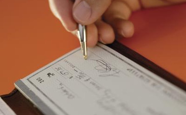 Man writing a check