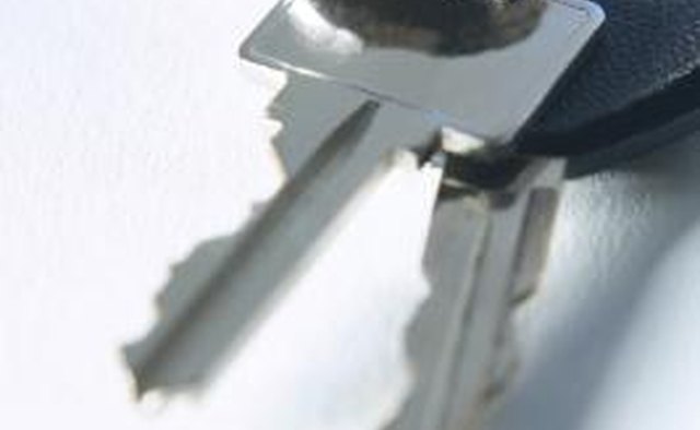 Heat or spray the key to thaw the lock.