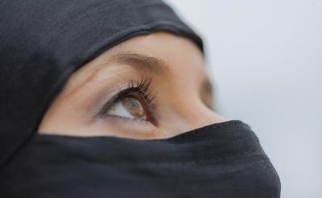 Close up of a veiled young woman