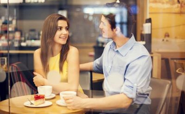 Couple talking over coffee