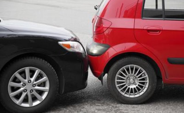 Two car bumpers touching
