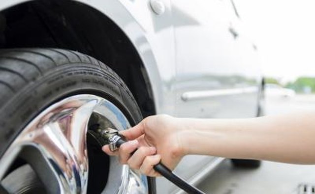 Car's tire getting inflated