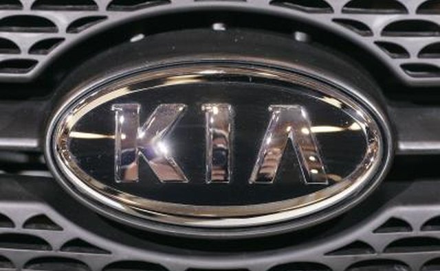 KIA brand on front of vehicle