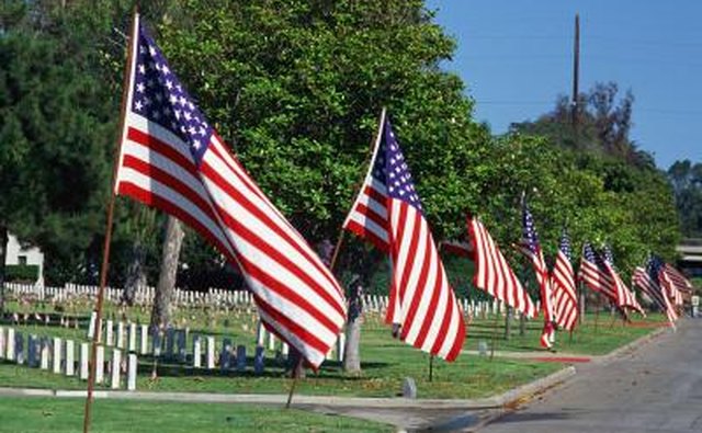 Flags are given positions of honor in military veteran's cemeteries.