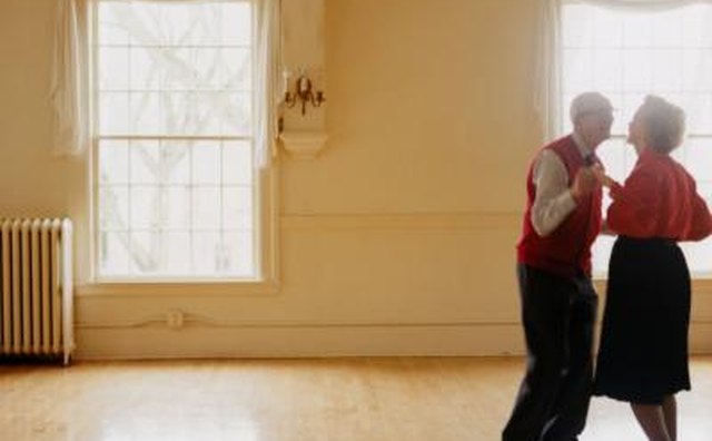 Senior couple dancing in empty room