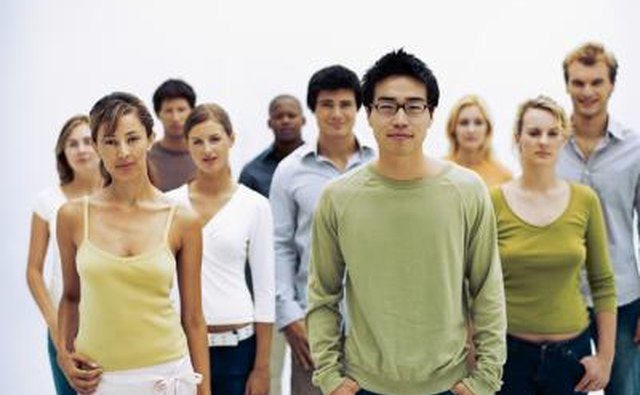 Portrait of young adults standing together.