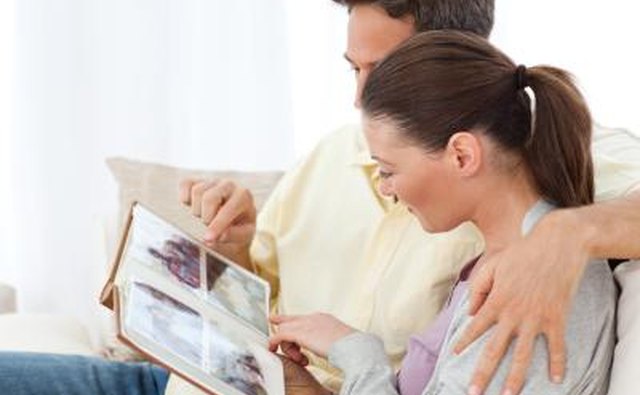 Couple looking at photo album