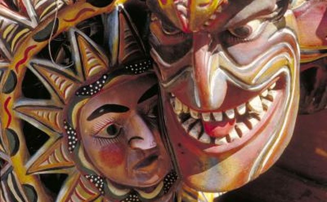 A close-up of two Mexican masks.