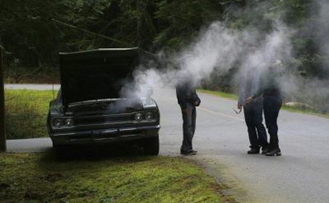 car smoking on side of road
