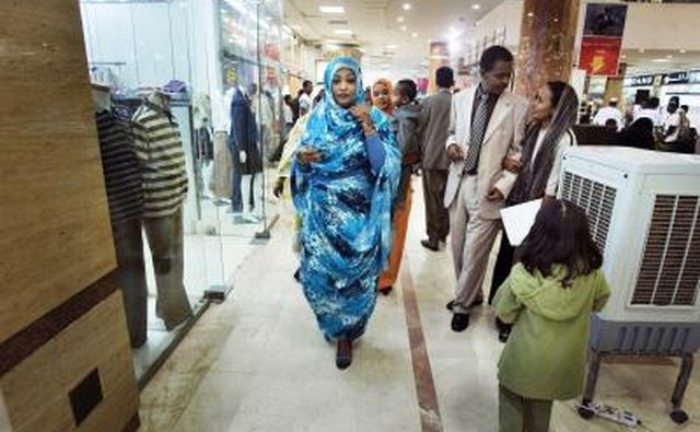 Sudanese woman walking in mall in Khartoum, Sudan