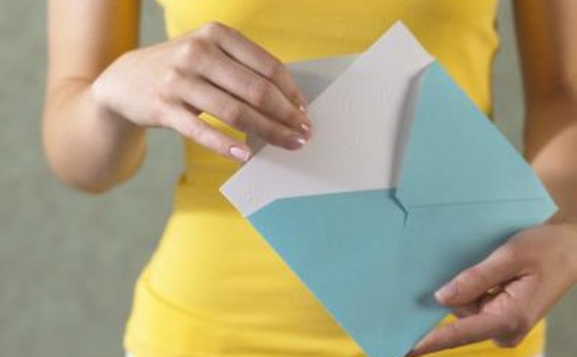 Woman holding card