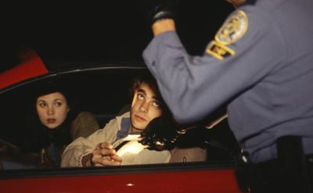 Teenagers talking to Police Officer