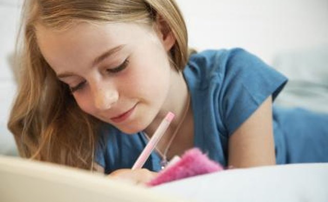 Girl writing down favorites list