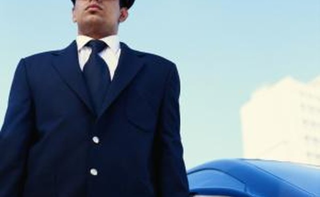A chauffeur uniform may include a low-key hat.