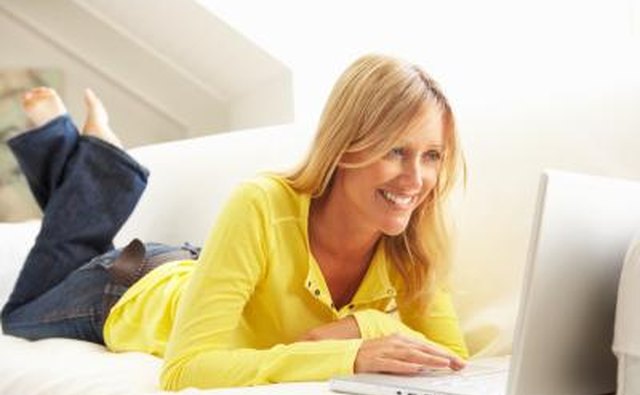 woman editing on computer