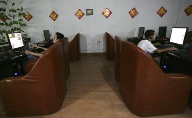 People surf the web at an Internet cafe in China