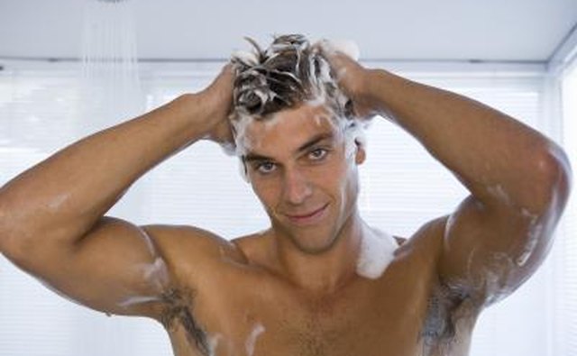young man showering