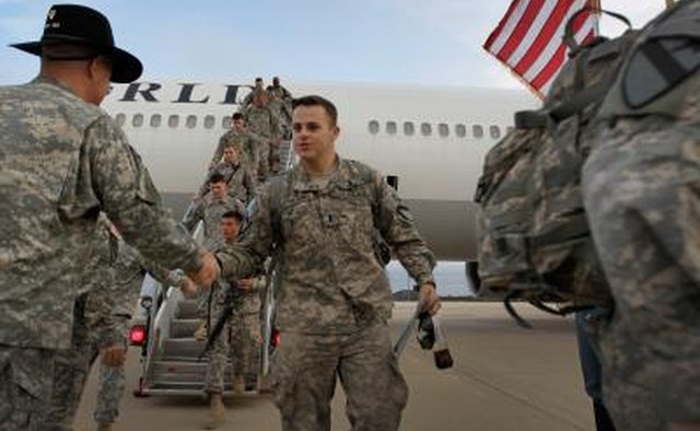 U.S. Army lieutenant being greeted upon return to home base at Fort Hood, TX.