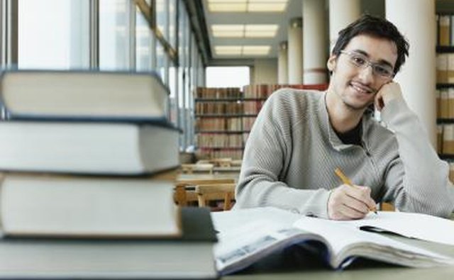 A portrait of a student studying in the library,