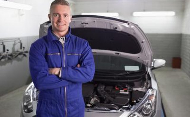 Mechanic with car.