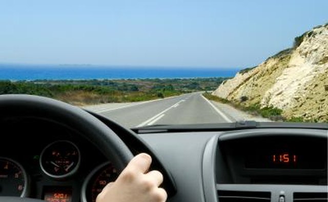 Woman driving scenic road