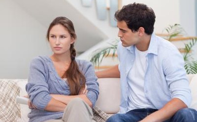 angry girlfriend sitting on couch