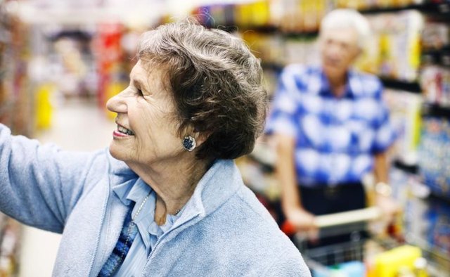 Senior woman shopping in drug store