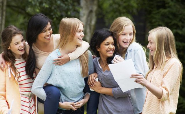 Girl scouts laughing together