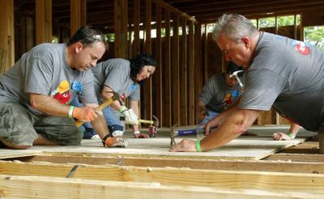 Habitat for Humanity volunteers building a house
