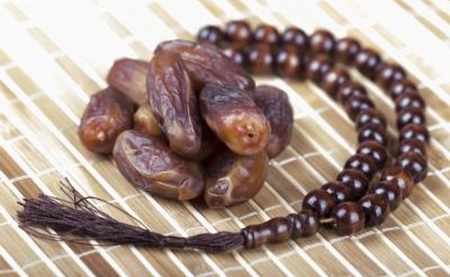 A prayer rug and beads is a useful gift.