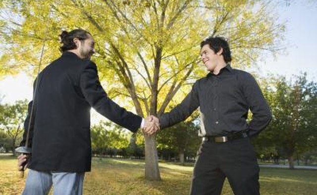 Friends shaking hands