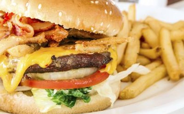 A cheeseburger with french fires.
