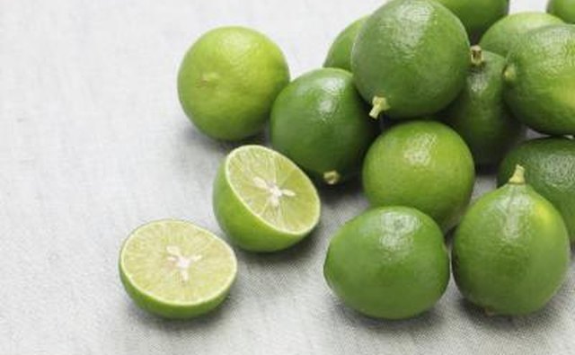 Fresh key limes on a table.