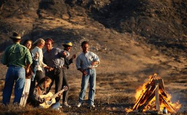 Practice acoustically by a bonfire.
