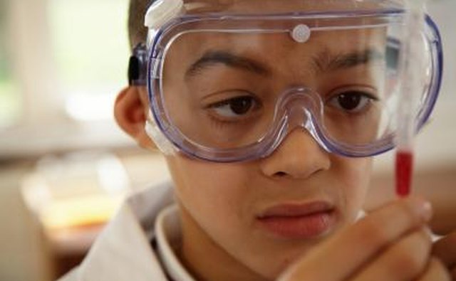 Young boy wearing safety goggles