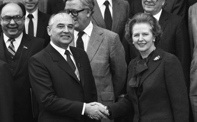 Soviet Politburo member Mikhail Gorbachev shakes hands with British Prime Minister Margaret Thatcher at Chequers on December 16, 1984.