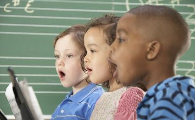 Children singing.