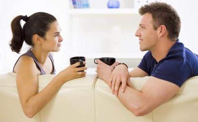 couple talking on couch