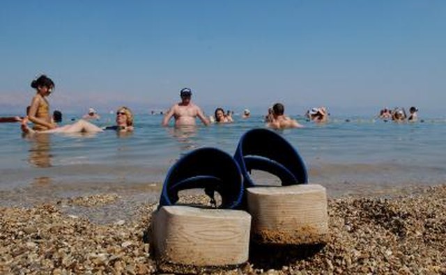 Tourists float in the Dead Sea area of the West Bank