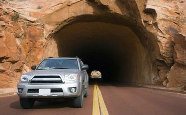 SUV driving on road