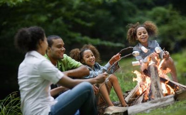 Hiking and camping are common pastimes for naturist families.
